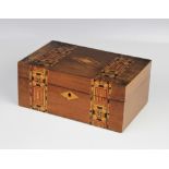 A mid 19th century parquetry banded mahogany sewing box, opening to a folding pocket above a
