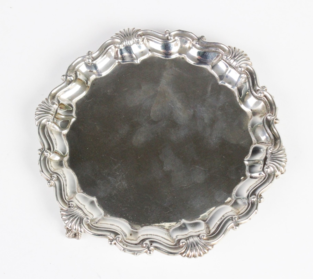 A Victorian silver salver by Martin, Hall & Co, London 1887, of hexagonal form with pie crust border