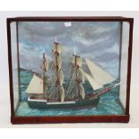 A cased handmade scratch-built model of a three masted tall ship named 'Olwen', 20th century, the