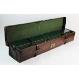 A leather shot gun case by Bussey of London, mid 19th century, of narrow rectangular form with