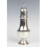 An Edwardian silver sugar caster by William Hutton & Sons, Sheffield 1907, of plain polished