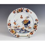 An 18th century Chinese porcelain imari charger, the circular plate decorated to the centre with