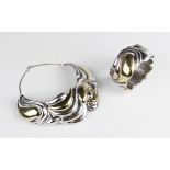 A two-toned silver organic design collarette and bangle by Yaacov Heller,