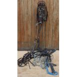 A collection of horse saddlery and tack, to include assorted stirrups, bits, leather girth,