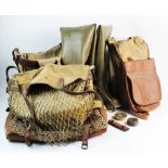 A collection of four assorted vintage angling bags and fishing equipment, leather and canvas,