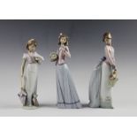 Three Lladro figures, comprising: 07622 Basket Of Love, 07644 Innocence In Bloom, and 07611 Summer