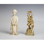 A Japanese signed ivory okimono, Meiji period (1868-1912), modelled as a performer holding a hand