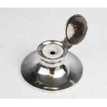 An Edwardian Scottish sterling silver mounted capstan inkwell, Brook & Son, Edinburgh 1907, of plain