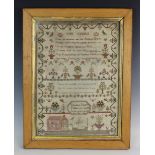 A George III needlework sampler, early 19th century, worked by Elizabeth Johnson and dated 1806, the