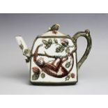 A Wedgwood majolica ?Monkey? ware teapot and cover, with naturalistic handle and cover knop,