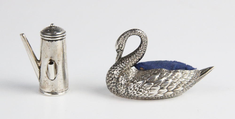 An Edwardian novelty silver pin cushion in the form of a swan by Adie & Lovekin Ltd, Birmingham