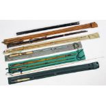 Six assorted fishing rods, to include; 'The Warrior' rod two-piece split cane, a four-piece split