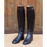 A pair of black leather riding or hunting boots with trees for 'Maxwell, Dover Street, London' (at