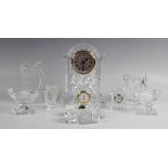 A Waterford Crystal mantel clock, 18.5cm high, with further Waterford Crystal ornaments