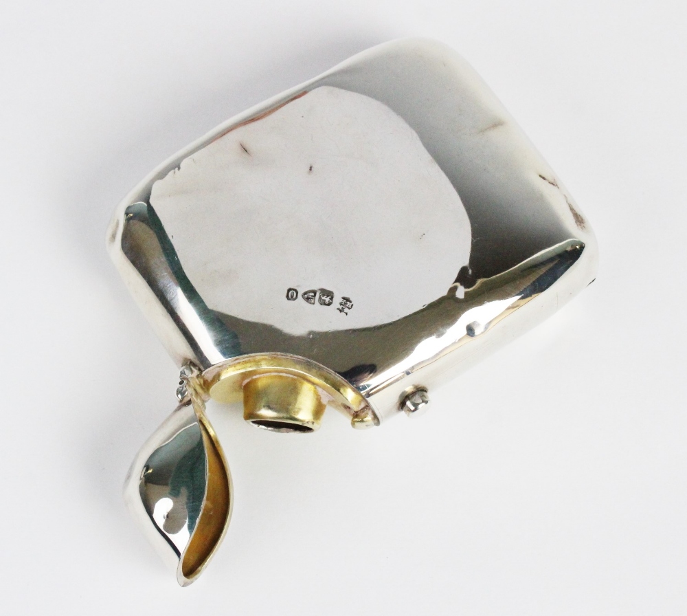 A late Victorian silver hip flask by George Nathan & Ridley Hayes, Chester 1897, of curved