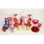 A collection of Victorian and later cranberry glass, to include a pair of ewers, 23cm high, a bell