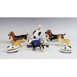 Six Beswick dogs, to include; Two Basset Hounds, 13cm high (one boxed), a yellow Labradors, 8cm