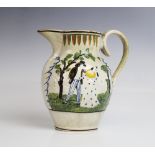An early 19th century pearlware Pratt decorated jug, relief moulded with figures in a landscape,