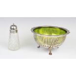 An Edwardian silver mounted cut glass sugar caster by Richard Owen Williams, Chester 1908, of
