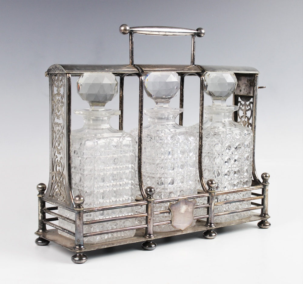 A silver plated three-bottle tantalus with Hobbs & Co London lock, of rectangular form with - Image 2 of 3