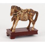 SCULTURA in avorio raffigurante "Cavallo" con applicazioni di pietre dure, base in legno (un piede