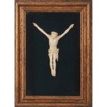 CRISTO in osso entro teca. Primi '900 Misure: cm 37 x 27 h cm 19