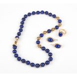 PARURE composta da COLLANA, ANELLO e da ORECCHINI in lapis e oro giallo 18 Kt. (g. 128.40).