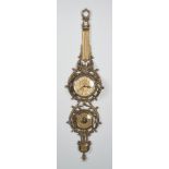 LOTTO composto da BAROMETRO in legno (vetro rotto) e da BAROMETRO con orologio in ottone dorato.