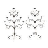 COPPIA CANDELABRI a sette luci in ferro. XX secolo Misure: cm 68 x 101