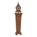 OROLOGIO stile Boulle in legno e rame con base a colonna. XX secolo Misure: cm 40 x 19,5 h cm 114 (