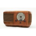 IMCA RADIO ALESSANDRIA RADIO in radica di noce e mogano. Anni '50 Misure: cm 66 x 32 h cm 38,5