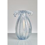 ERCOLE BAROVIER Vaso iridescente in vetro trasparente, bocca a tentacoli. Bibliografia: M. Barovier,