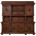 CREDENZA Enrico II a quattro ante con alzata in rovere riccamente intagliata. Francia XIX secolo