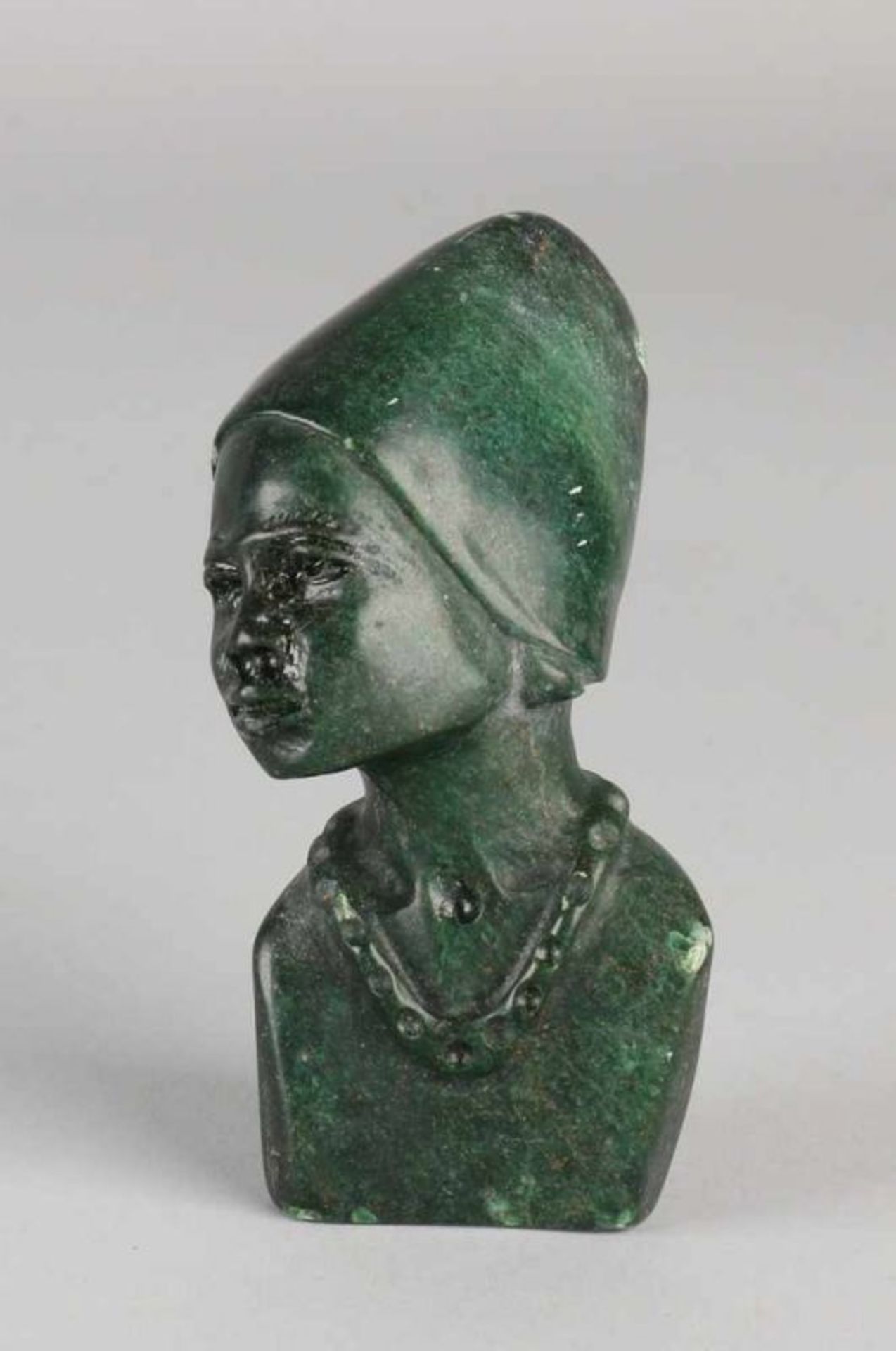African women's marble bust. 20th century. Size: H 10 cm. In good condition.