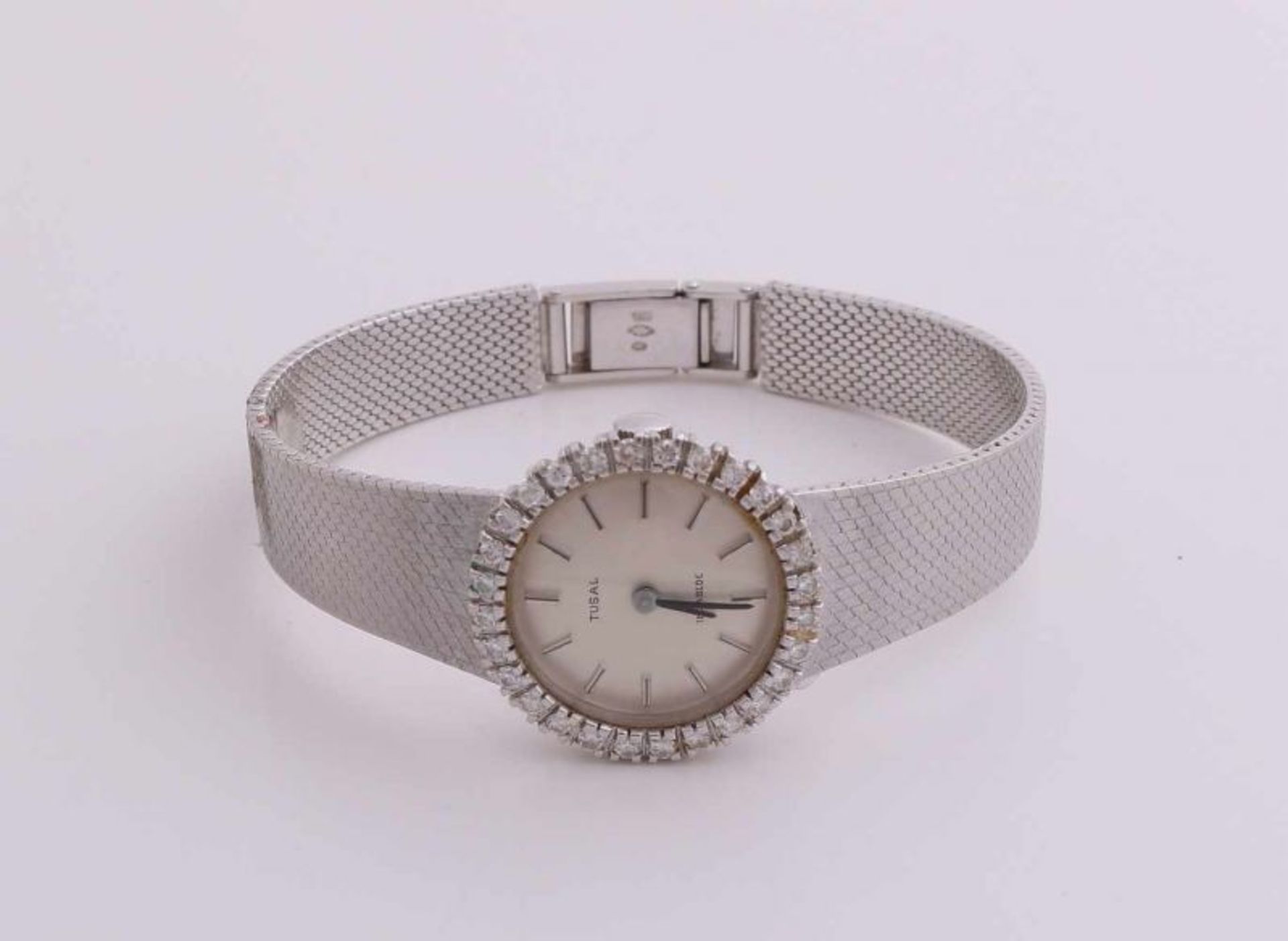 Stunning white gold watch, 585/000, with diamonds. Tusal ladies' wristwatch with a round case, ø