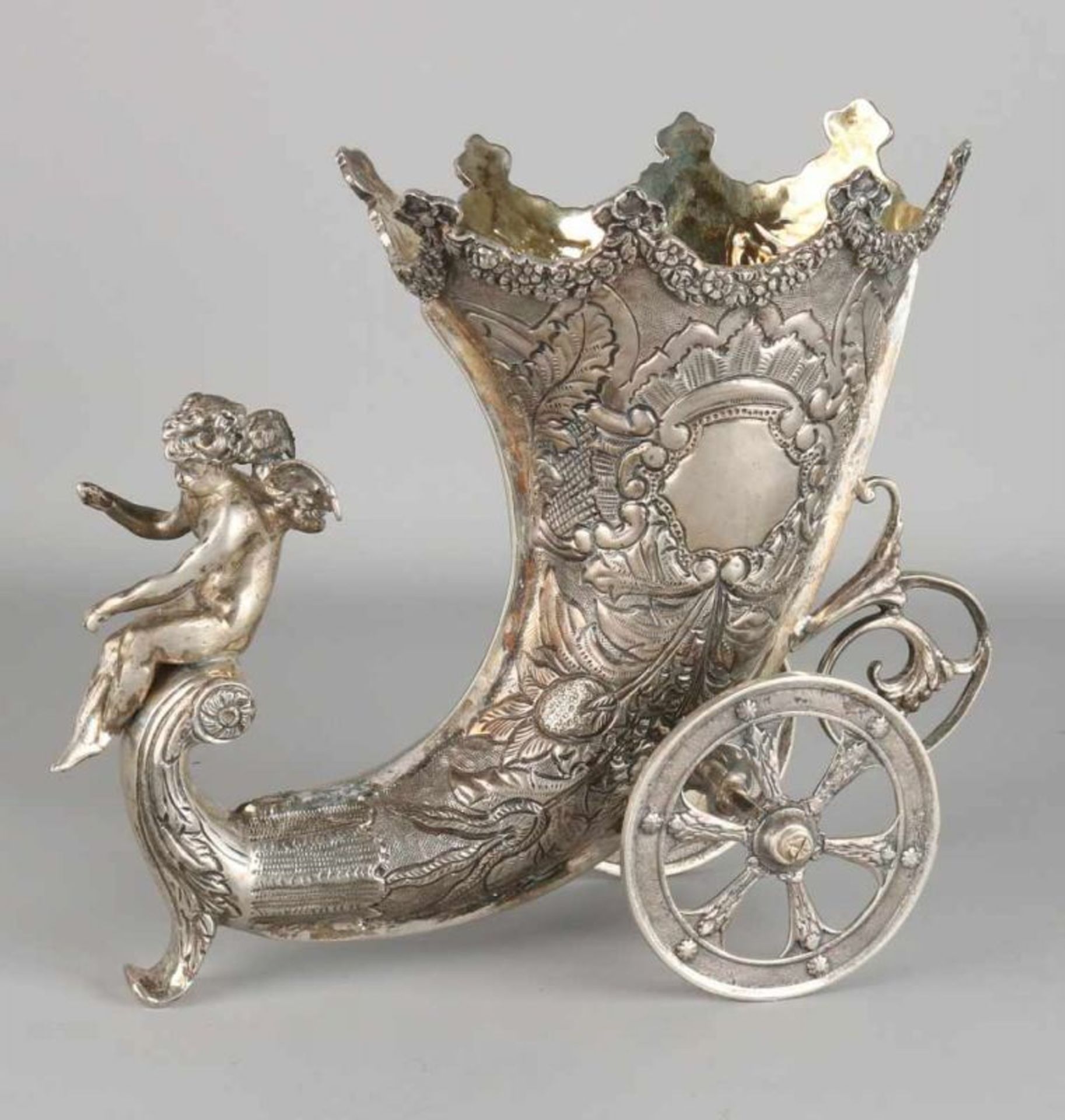 Impressive silver table piece, 925/000, a car in the shape of a cornucopia adorned with floral