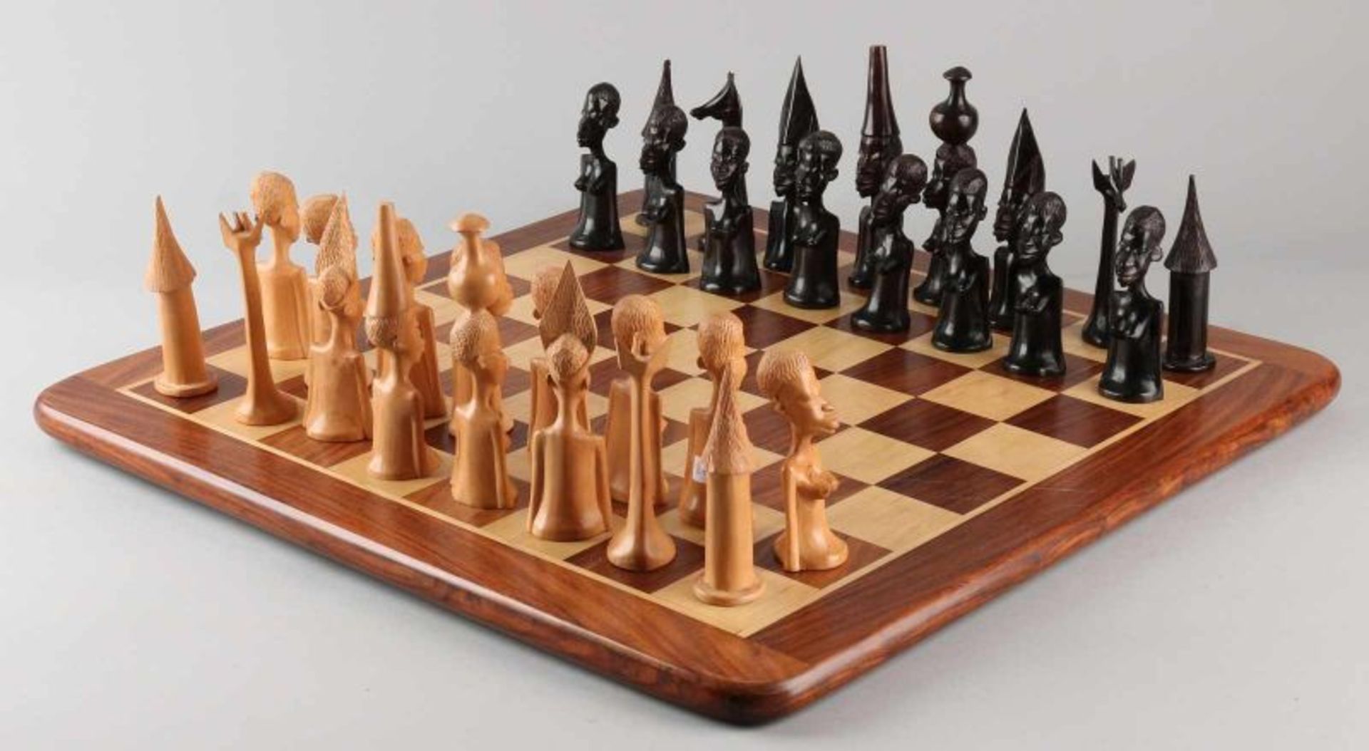 Two carved chess sets. One time set Normans + wooden chessboard. One time set Africa, Madagascar + - Image 3 of 5