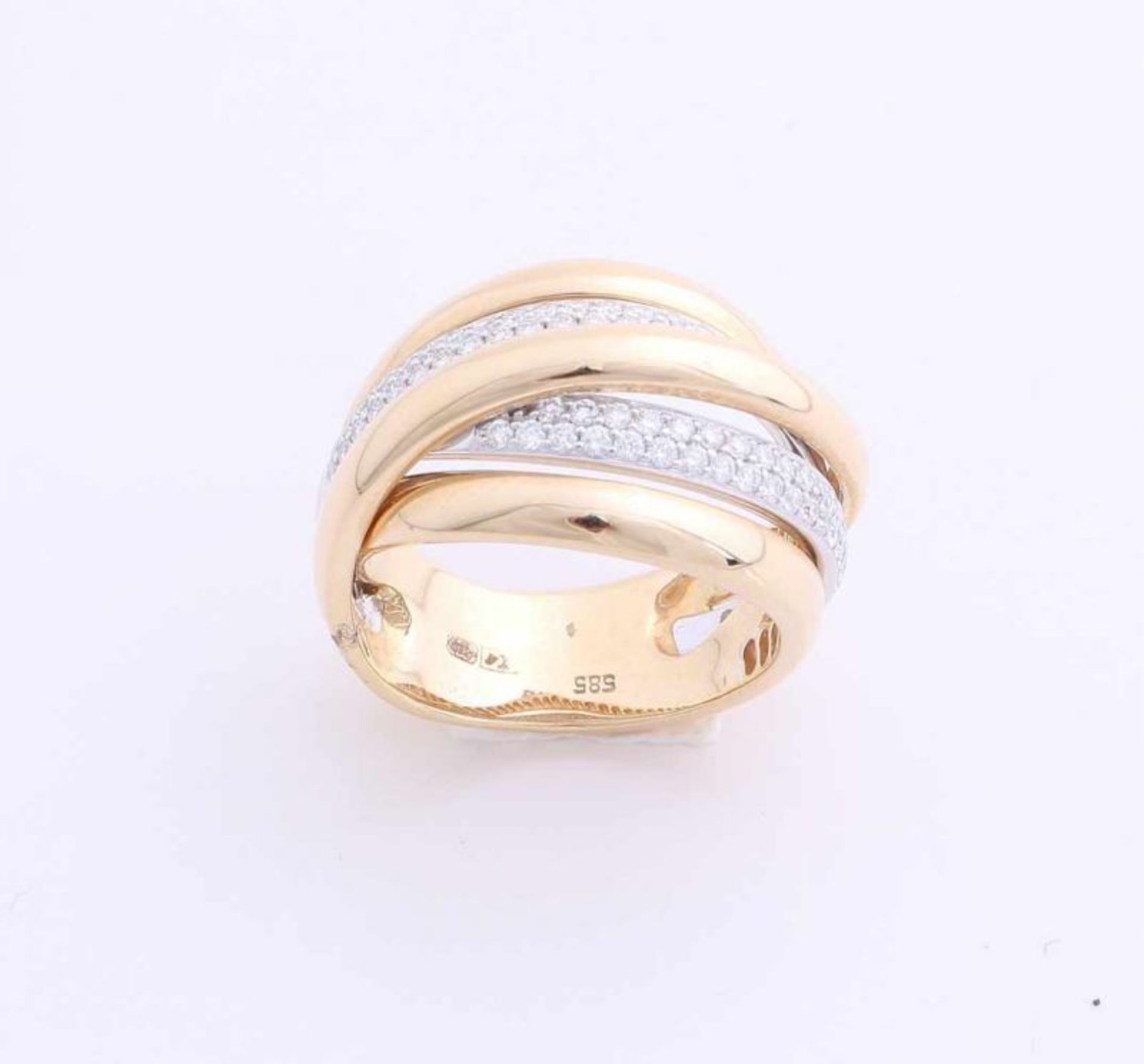 Broad yellow gold ring, 585/000, with diamond. Twisted ring having 5 jobs, two jobs are set with