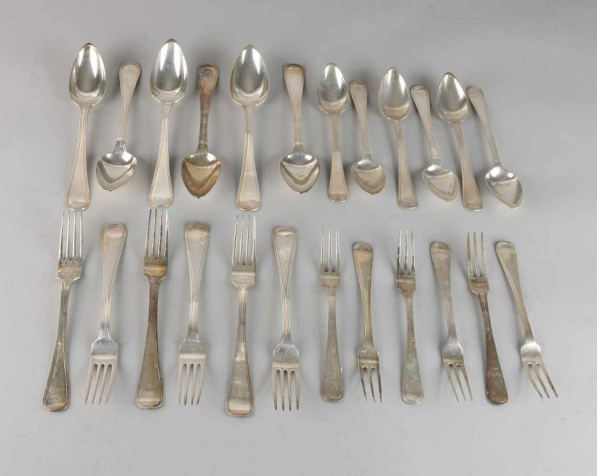 Silver cutlery, round model with fillet border consisting of six table forks, and spoons, 925/000,