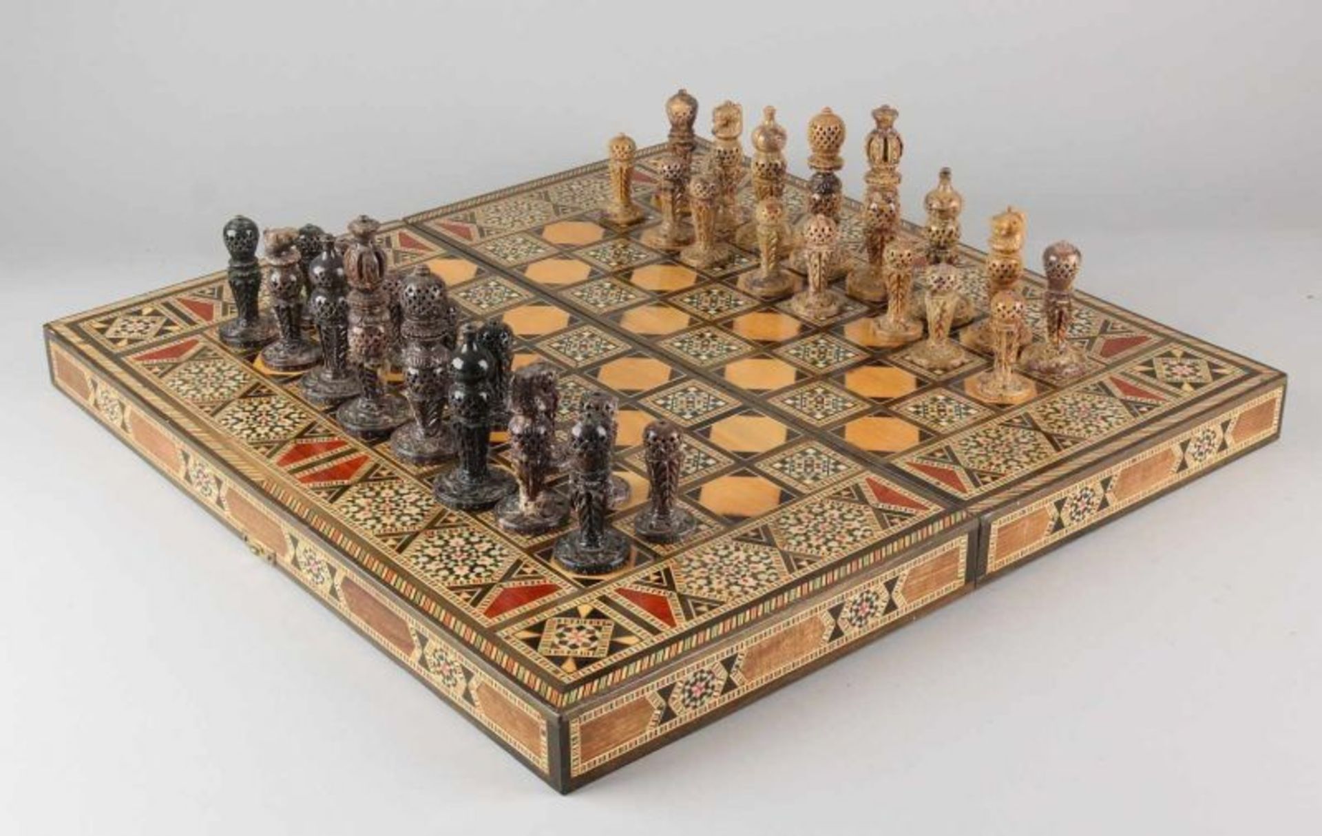 Eastern soapstone chess with intarsia chessboard. Morocco / Turkey. Size: 16 x 50 x 50 cm. In good