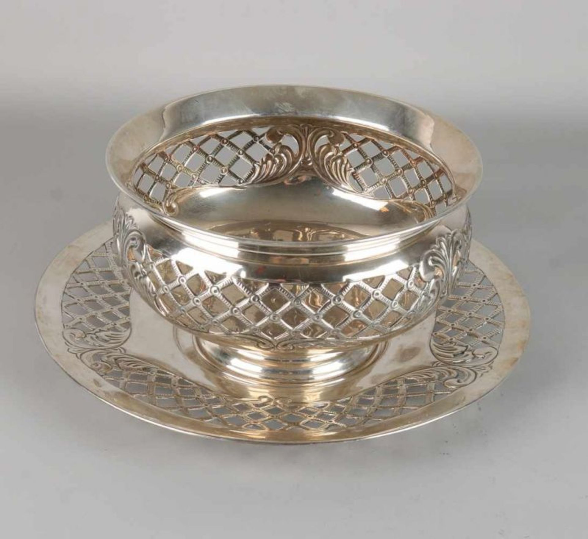 Beautiful silver serving plate with lower dish, 835/000, round model with sawn grid pattern, and