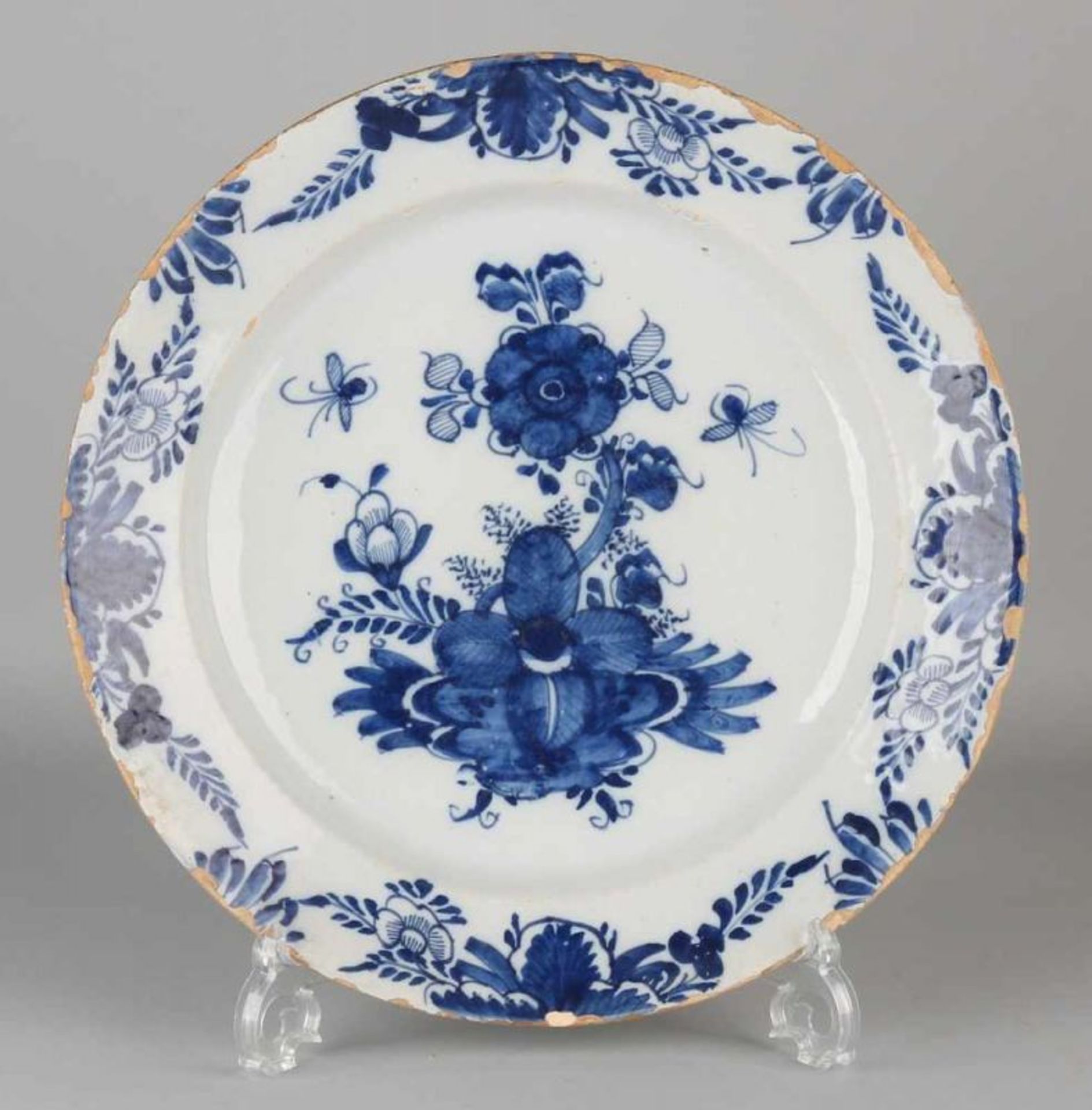 Large 18th century Delft Fayence decorative plate with floral decoration. "The Klaauw. Slight
