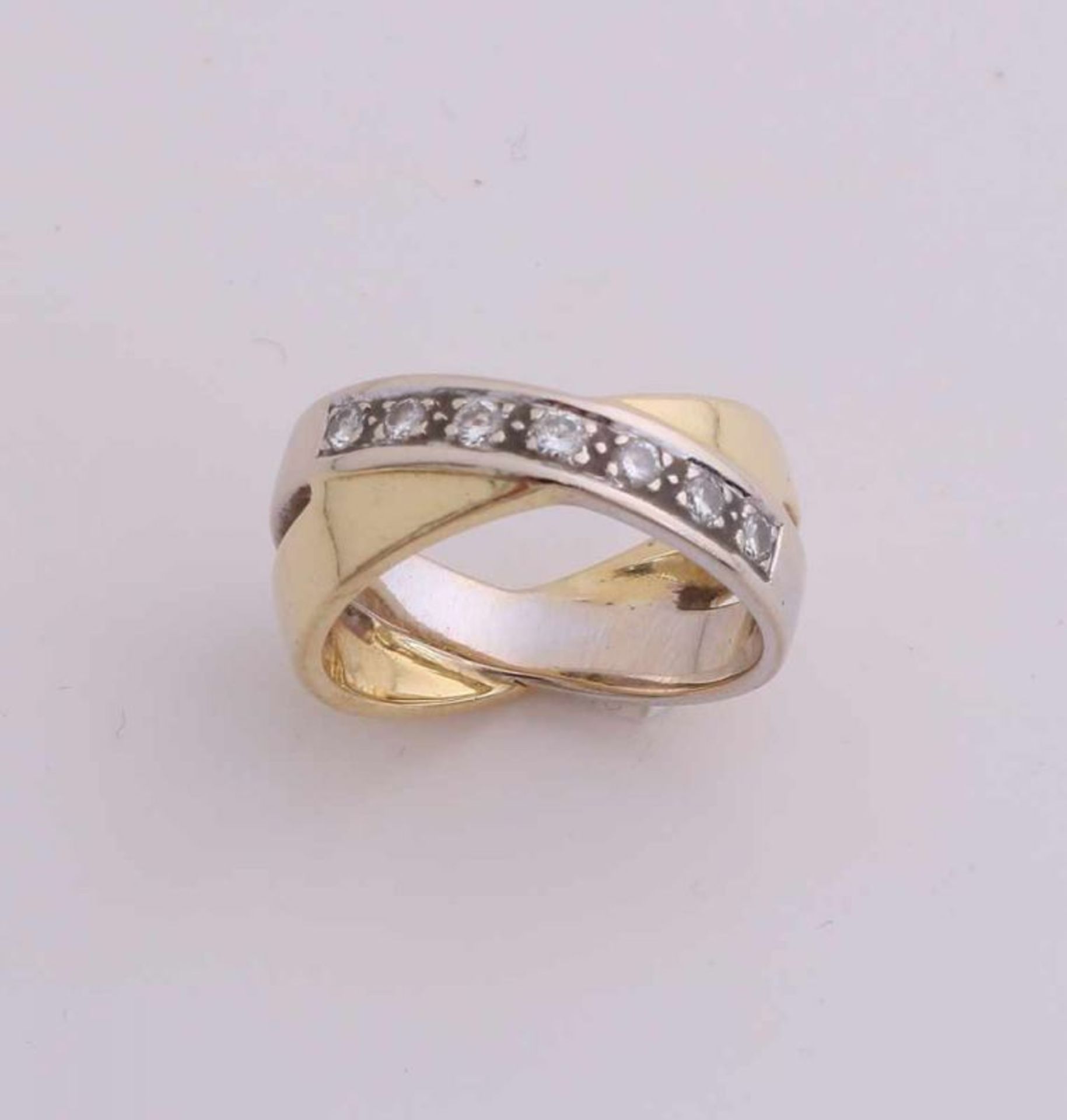 Gold ring 750/000 with diamond. Wide double ring, occupy a smooth yellow gold and white gold put