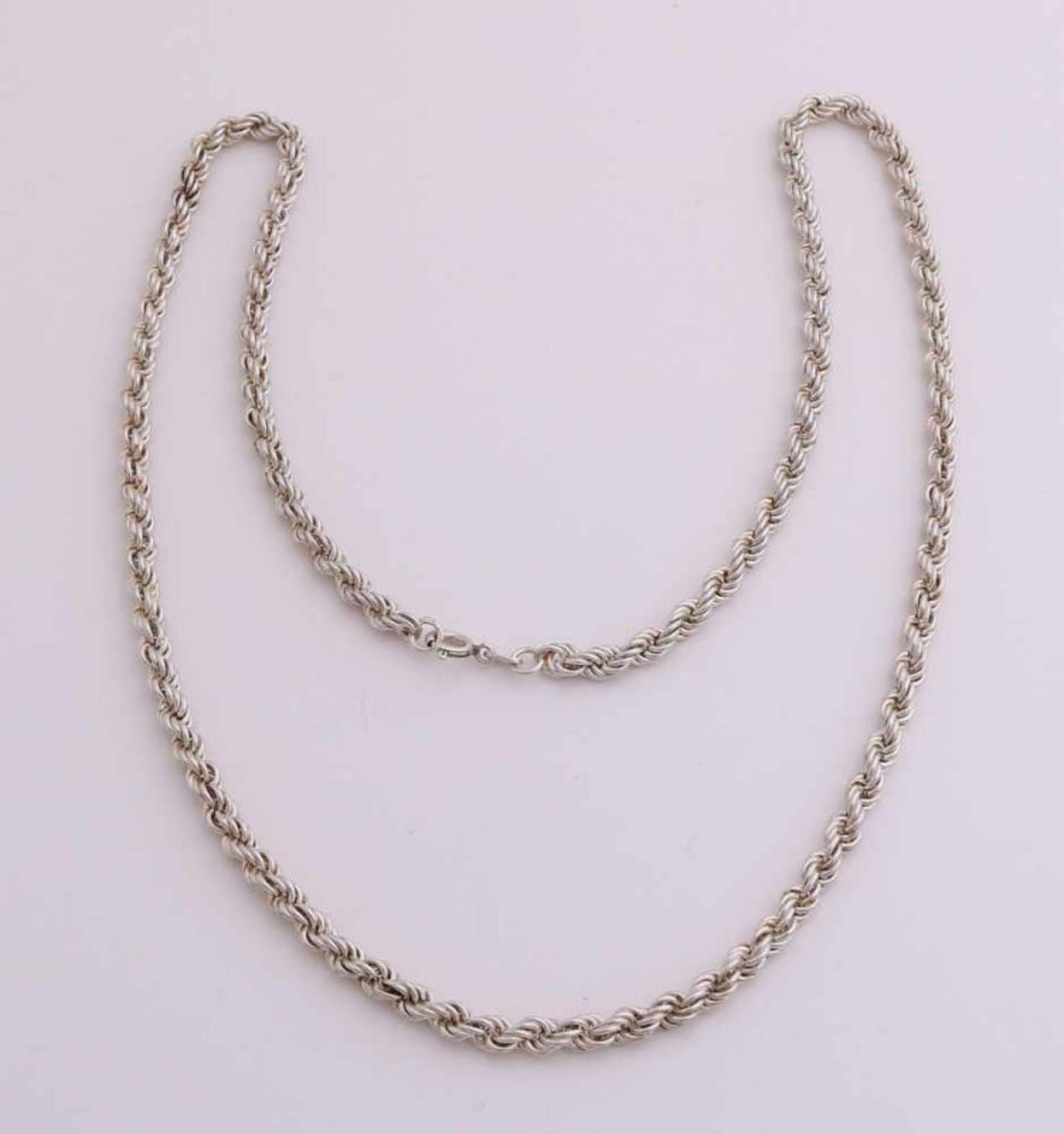 Silver cord necklace, 925/000, provided with spring eye. ø4,5mm. 60 cm. approximately 38 grams. In