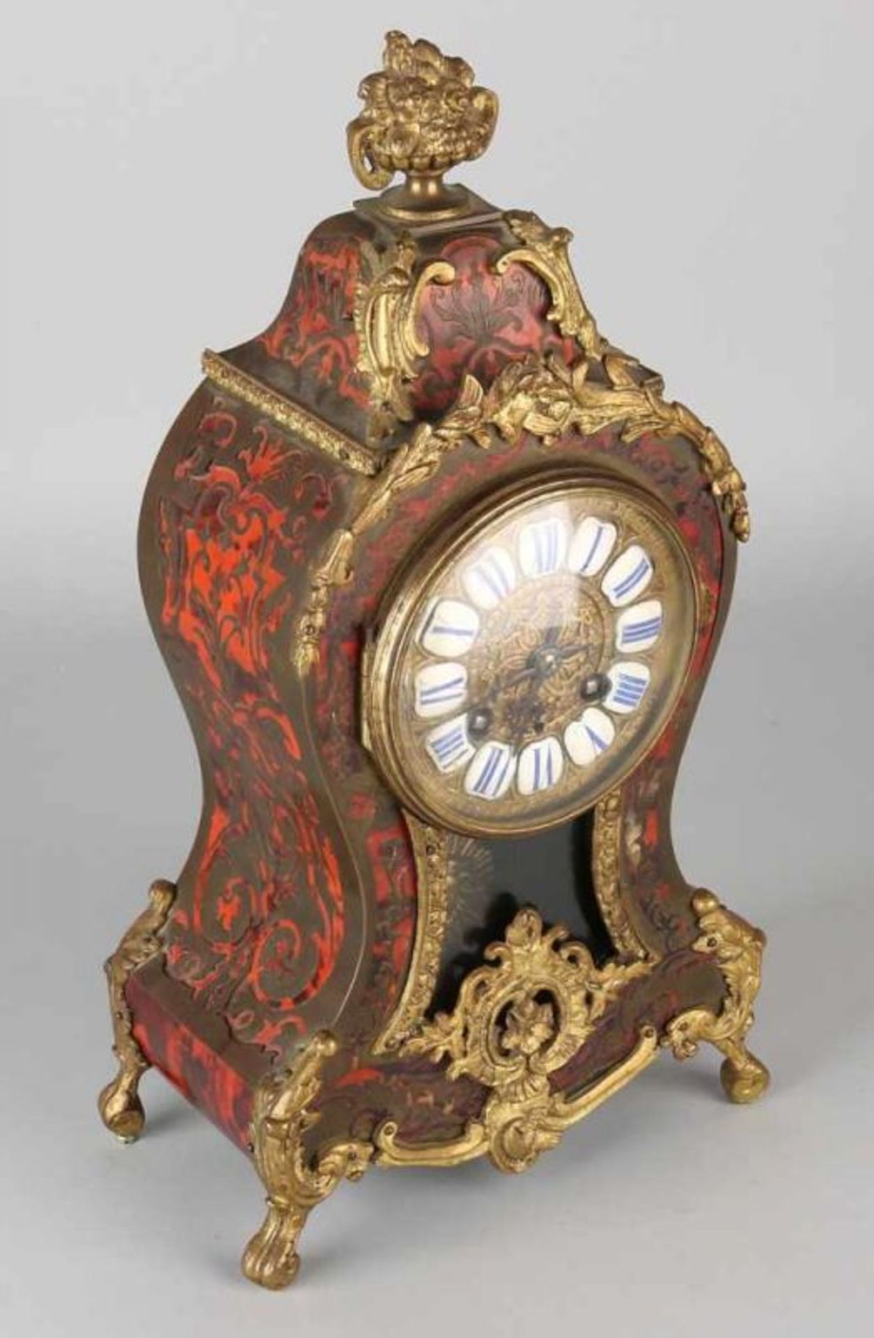 Small antique French red boulle pendulum. Circa 1890. Eight day-movement, half-hour battle on coil