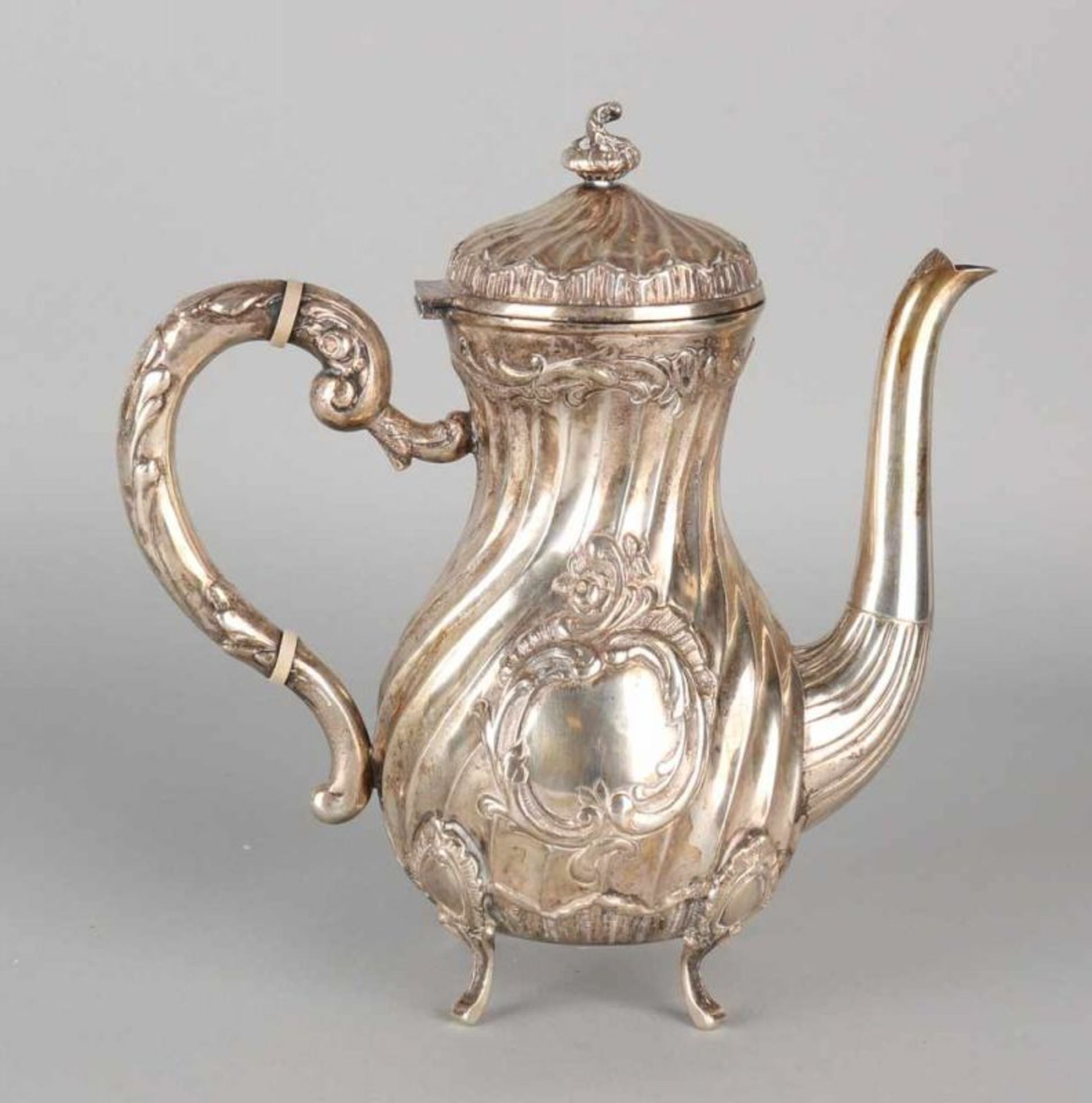 Silver coffeepot, 835/000, rococo style with a twisted operation and elaborated cartouche and