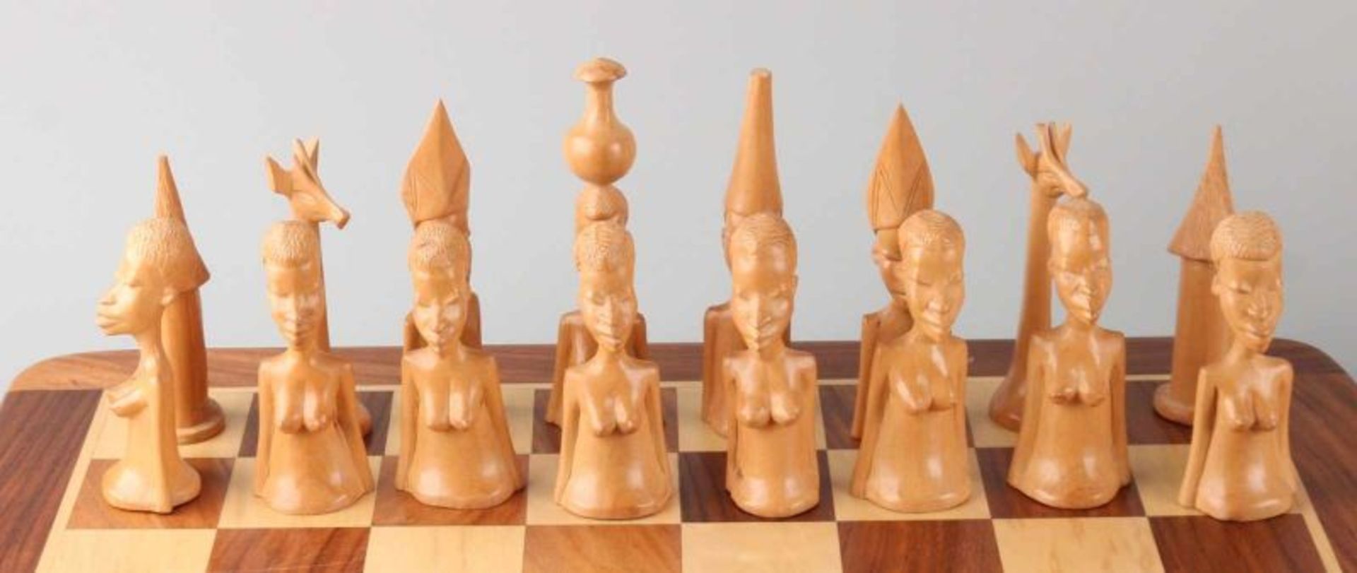 Two carved chess sets. One time set Normans + wooden chessboard. One time set Africa, Madagascar + - Image 4 of 5