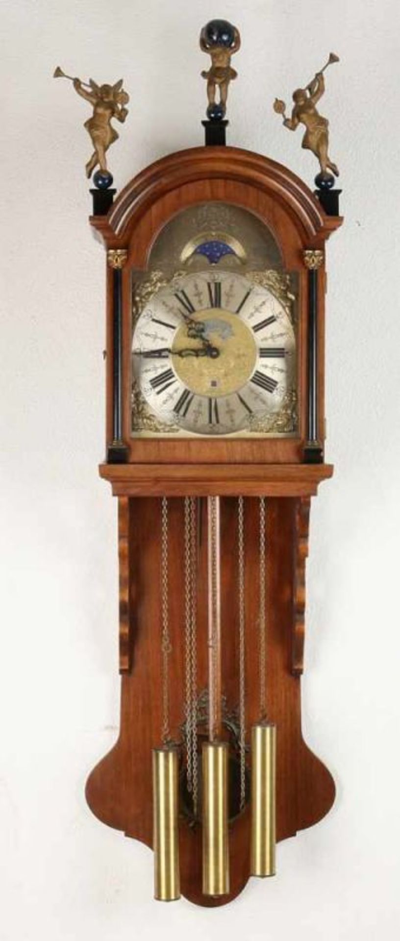 Westminster Frisian clock quarter striking, date display and moon phase. Walnut. Second half 20th