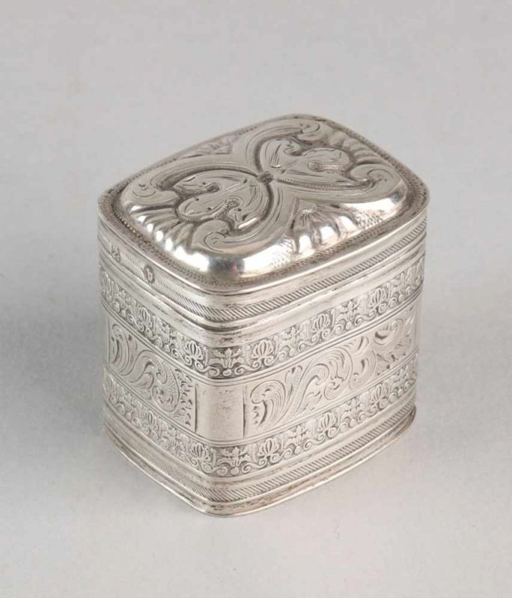 Antique silver 835/000 loderein box with floral decor jobs, Biedermeier engravings and raised lid. A