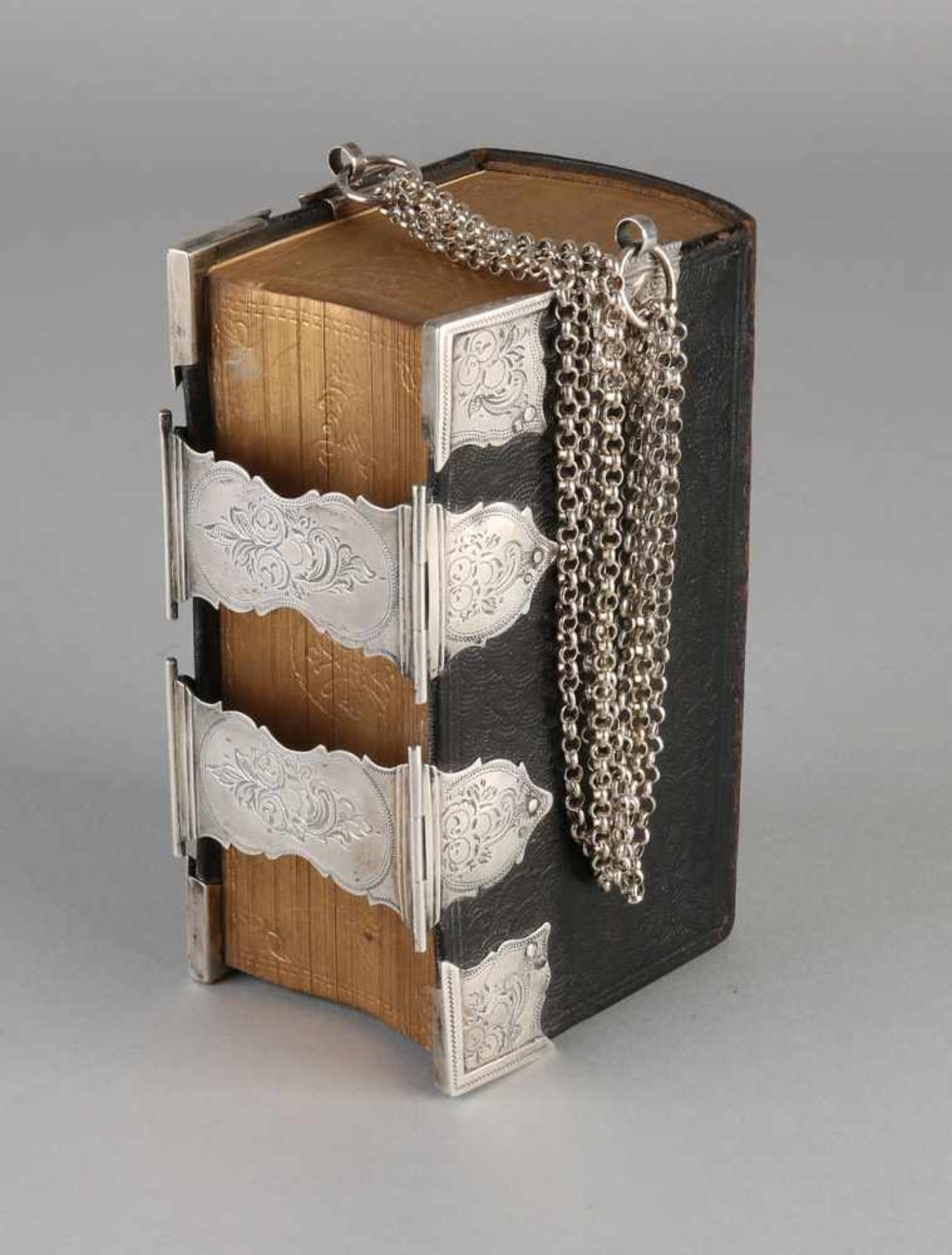 Bible with silver. Bible with leather cover and gold on silver slice provided with corner pieces,